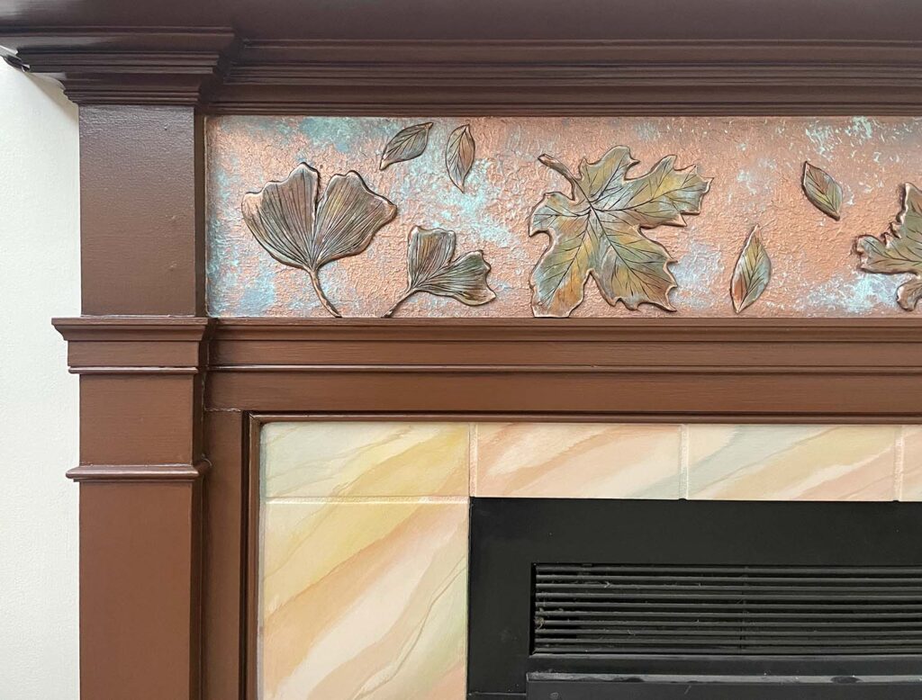 copper leaf sculpture fireplace