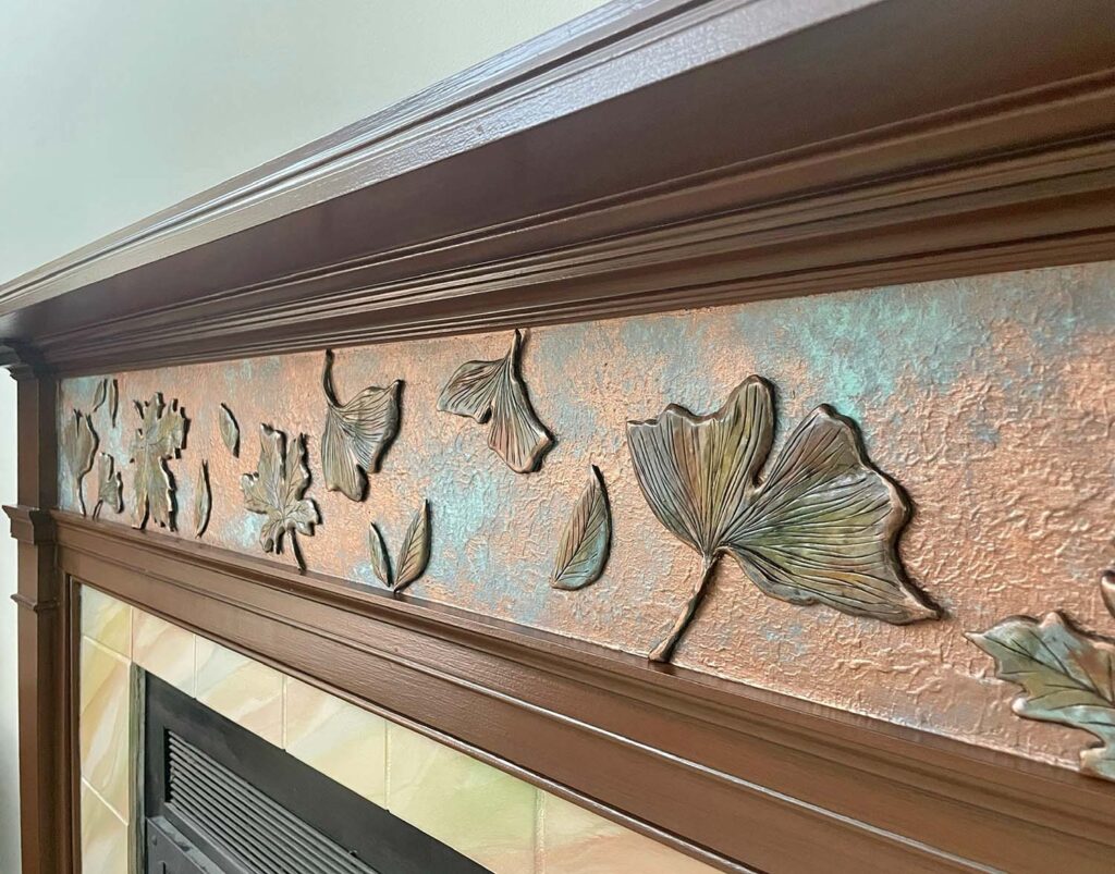 copper leaf sculpture fireplace