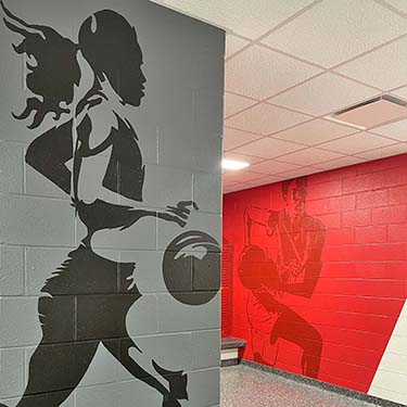 Center Grove locker room sports murals