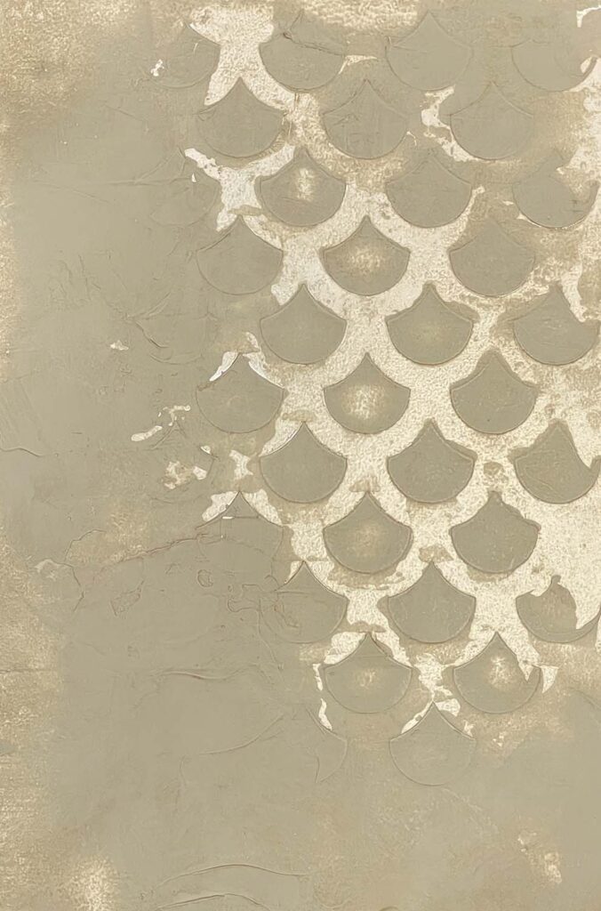 Raised stencil with plaster overlay wall texture